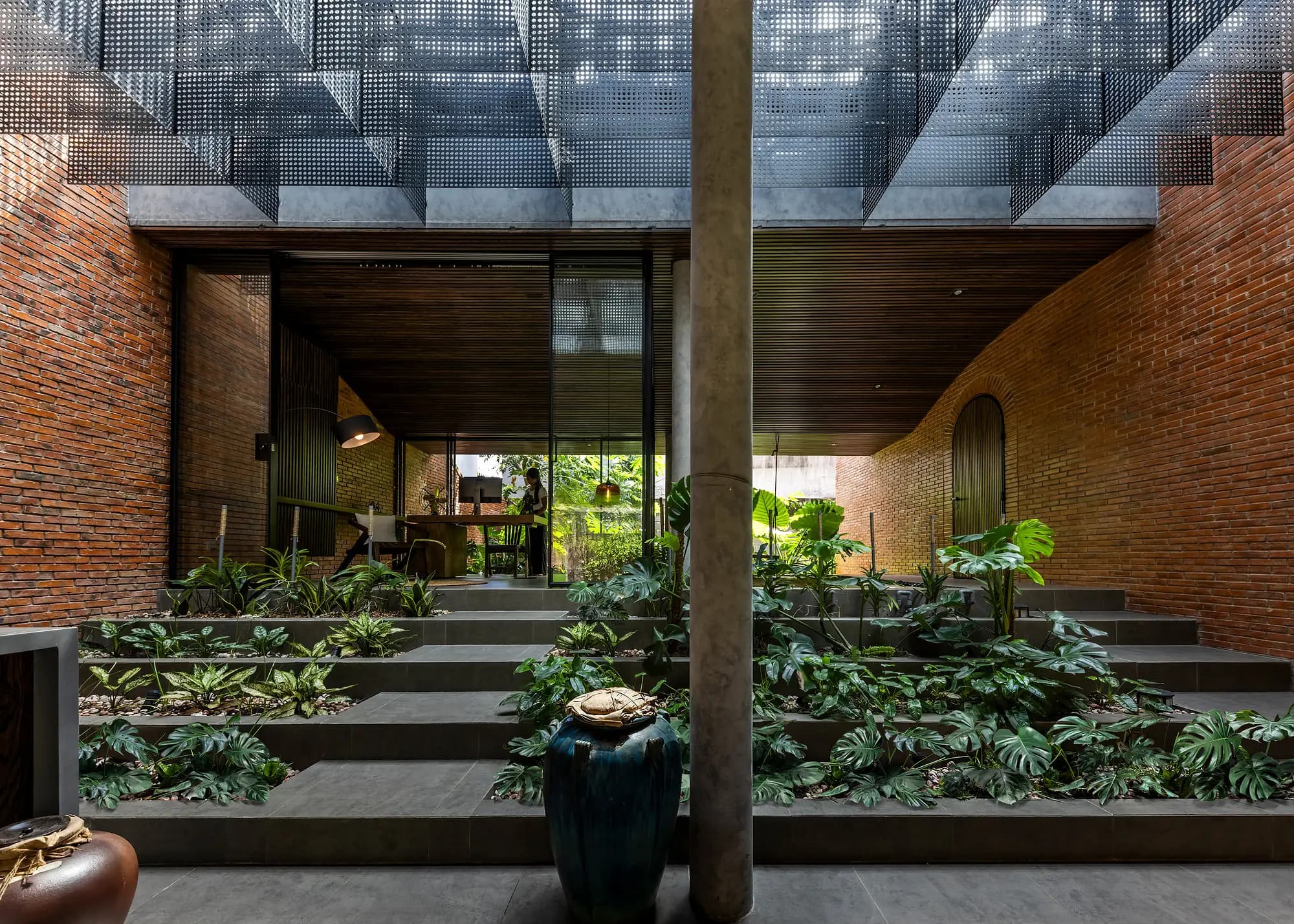 Why This Saigon Home Replaced Its Front Door with a Moat
