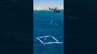 Helicopter High Dive Into A Shark Cage 🚁🦈 | Ultimate Shark Dive | Shark Week
