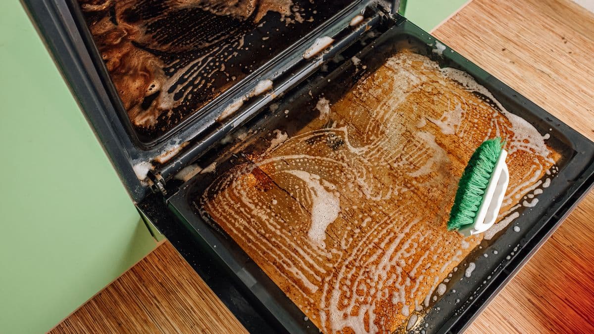 Easy way to clean oven grease with a bathroom item