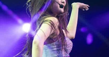 Pregnant Singer Performs for Fans