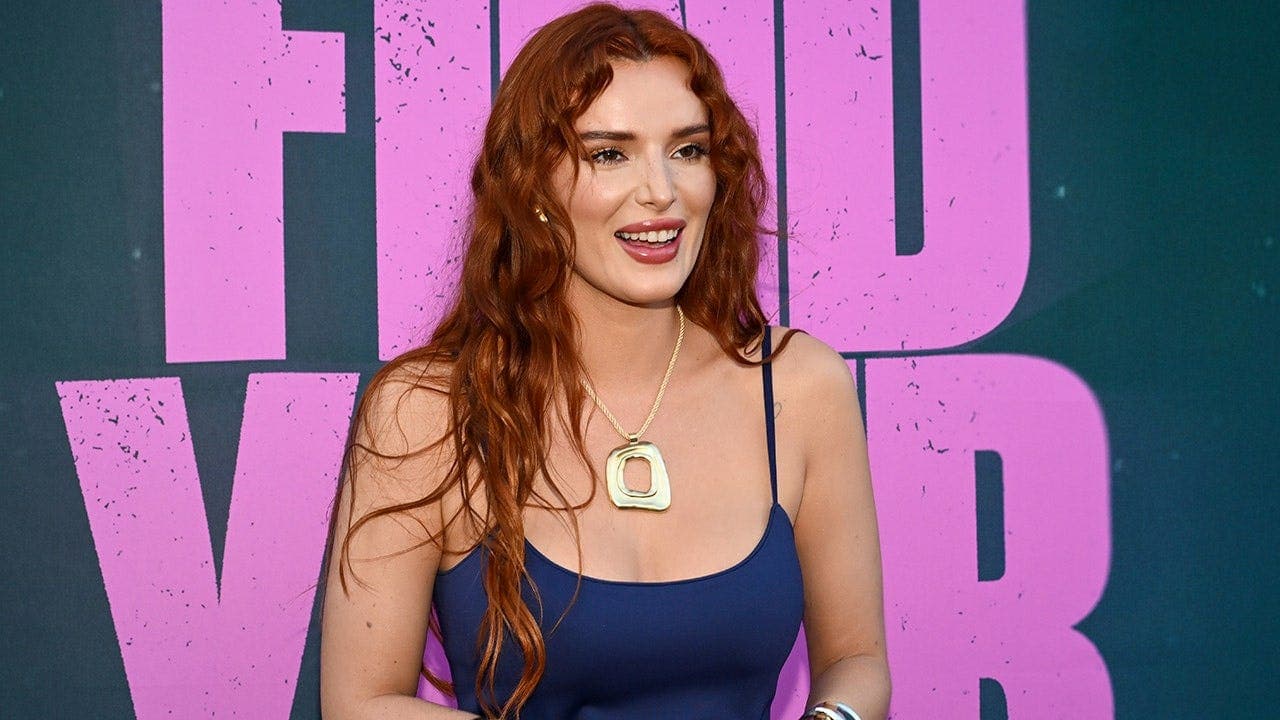 Bella Thorne Wears Green Bikini at the Beach
