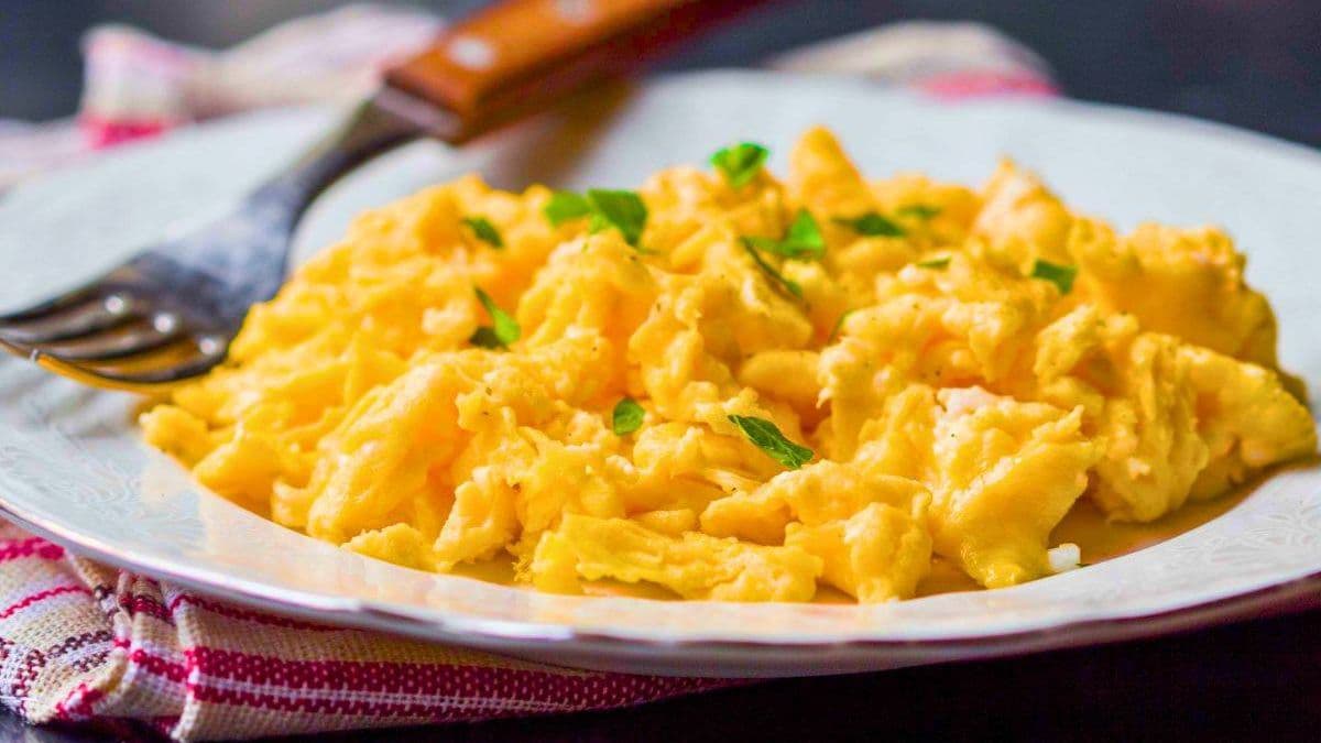 Use sour cream for better scrambled eggs